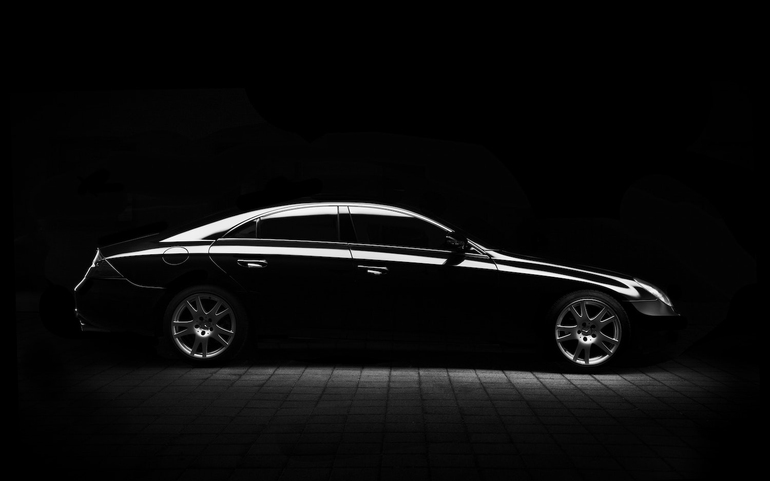 luxury black vehicle sedan